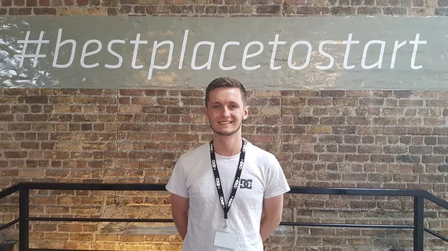 Cathal O'Sullivan at the NDRC in Dublin's Digital Hub, in front of the #bestplacetostart wall, from RTÉ's 2016 profile of GameX.